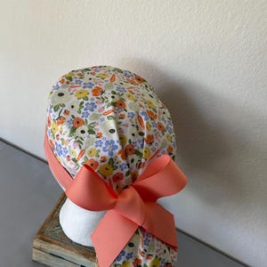 Avengers Ponytail Scrub Hat: Pediatric Nurse, Adjustable Buttons. Orange Carrot Flower