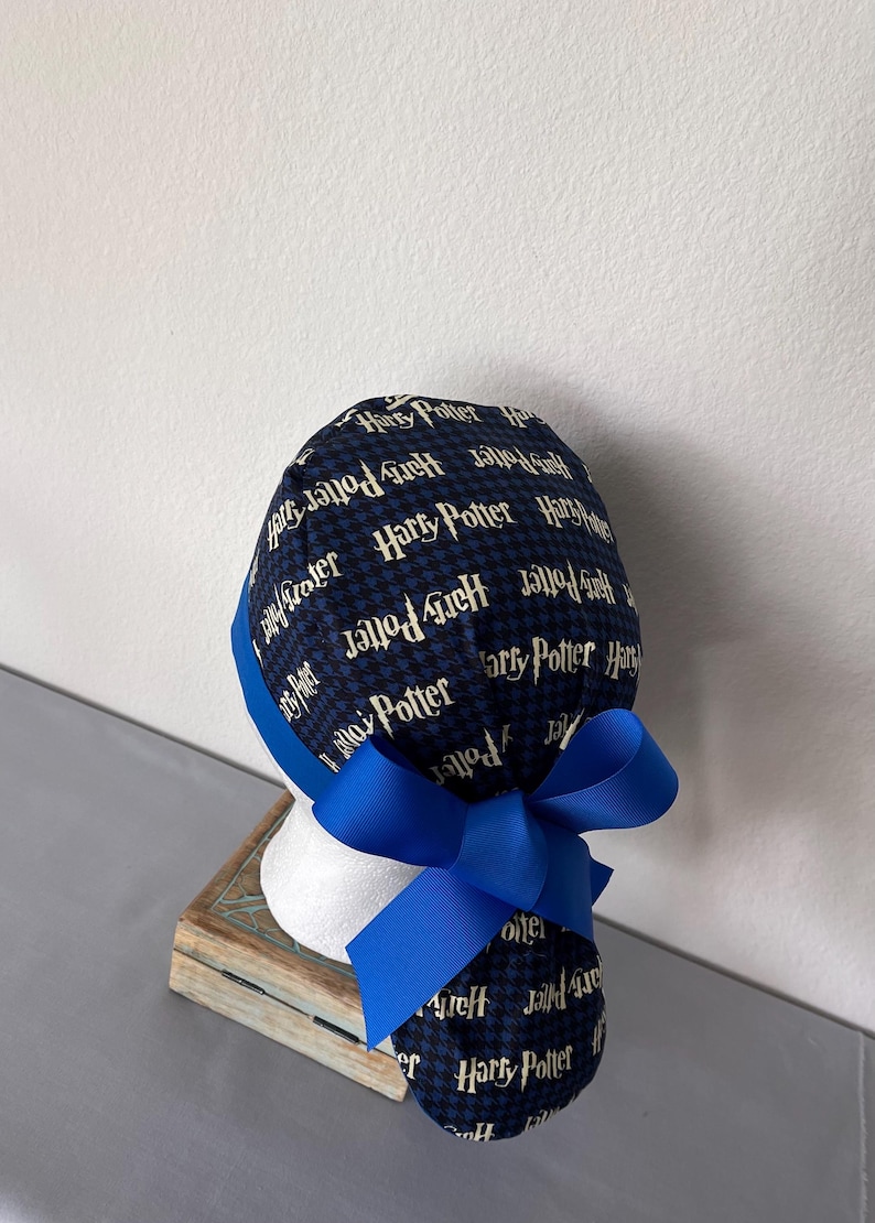 Avengers Ponytail Scrub Hat: Pediatric Nurse, Adjustable Buttons. Harry Potter blue