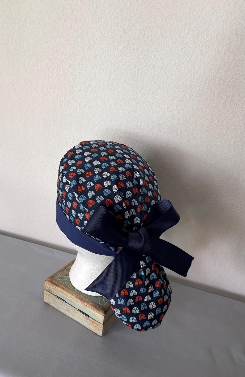 Avengers Ponytail Scrub Hat: Pediatric Nurse, Adjustable Buttons. RainbowOnNavy