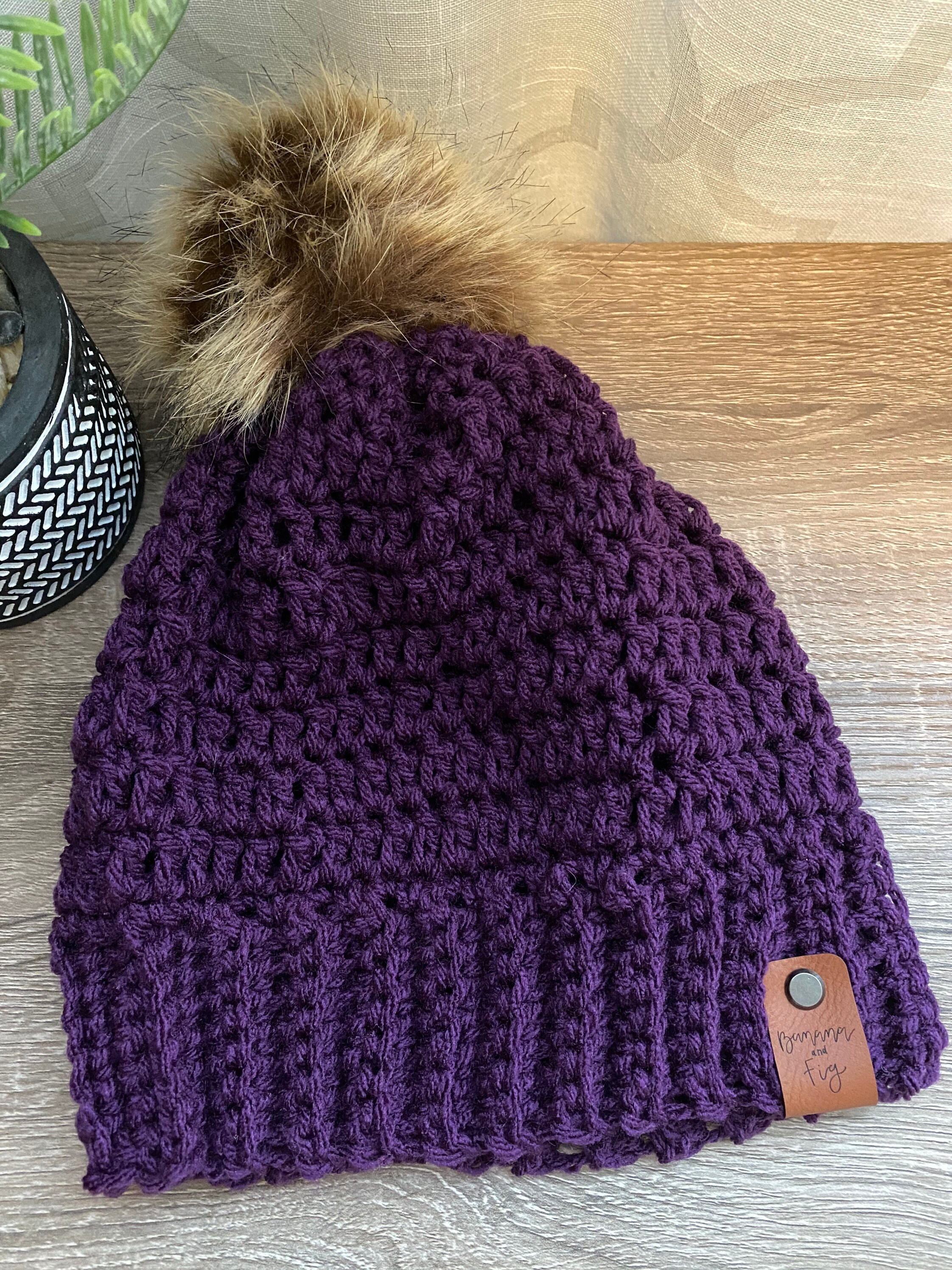 purple beanie with eye