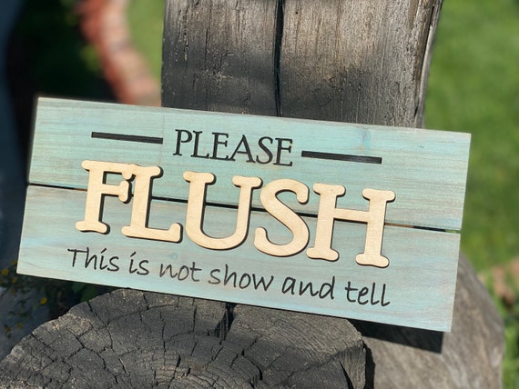 Flush toilet sign