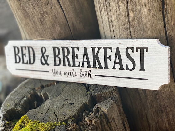 Laser engraved bed and breakfast, farmhouse style with white washed finish sign.