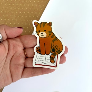 Cute Reading Cat Sticker | Reading sticker, Cat Sticker, bookish stickers, computer stickers, booktok stickers, laptop stickers