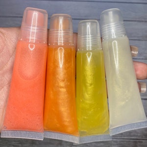 Set of 4 lip glosses/ lip balms