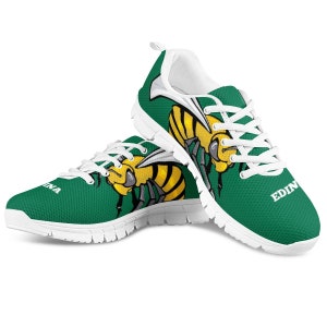 May include: White athletic shoes with green and yellow bee graphic. The shoes have white laces and the text "EDINA" on the side.