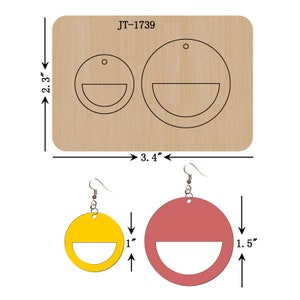 May include: A wood template for making earrings. The template has two circles, one 1.5 inches in diameter and the other 1 inch in diameter. Both circles have a half-circle cut out of the bottom. The template is labeled JT-1739.
