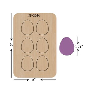 May include: A wooden craft die with six egg-shaped cutouts. The die measures 3 inches by 2 inches. A separate purple egg-shaped cutout measures 0.71 inches.