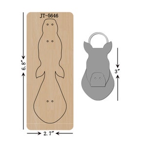 May include: A wooden die-cut in the shape of a platypus, measuring 6.8 inches long and 2.7 inches wide, next to a gray die-cut of a hippo head, 3 inches tall. The wooden die-cut has the text "JT-5646".