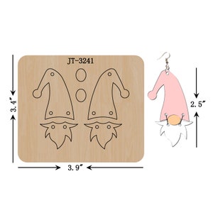May include: Wooden die cut for gnome earrings, 3.9 inches wide and 3.4 inches tall, with two gnome hat outlines and two circle cutouts. A finished pink gnome earring is 2.5 inches tall. The die is labeled "JT-3241".