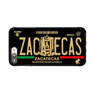 May include: Black phone case with a gold and black license plate design. The license plate says "Zacatecas" and "Transporte Privado Automovil".
