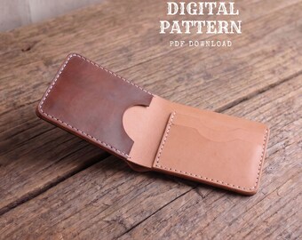 May include: A bifold wallet featuring a dark brown leather exterior and a lighter tan leather interior with visible white stitching. The text DIGITAL PATTERN PDF DOWNLOAD is printed in white above the wallet, indicating a downloadable file.