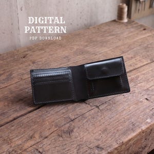 May include: A black leather bifold wallet featuring multiple card slots on the left side and a coin pocket with a snap closure on the right side. The text DIGITAL PATTERN PDF DOWNLOAD is visible in the upper left corner of the image.