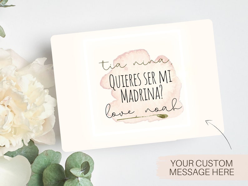 May include: A pink watercolour card with the text "Tia Nina, quieres ser mi madrina? Love, Noah".