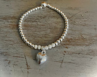 Sterling silver beaded stacking bracelet with heart charm