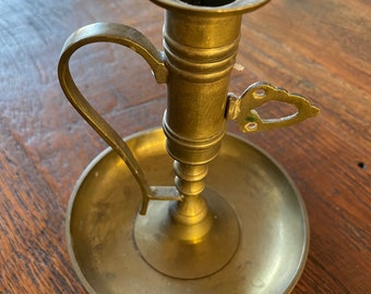 Antique nineteenth century Skultuna Swedish brass candle holder with push up lever for adjustable height, riser candlestick
