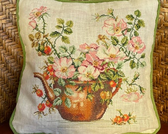 Cushion hand embroidered pink and white roses in a copper kettle with a scarlet orange red backing