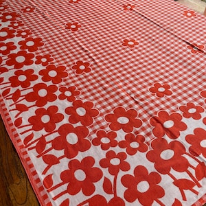 Red and white vintage checked tablecloth with flowers