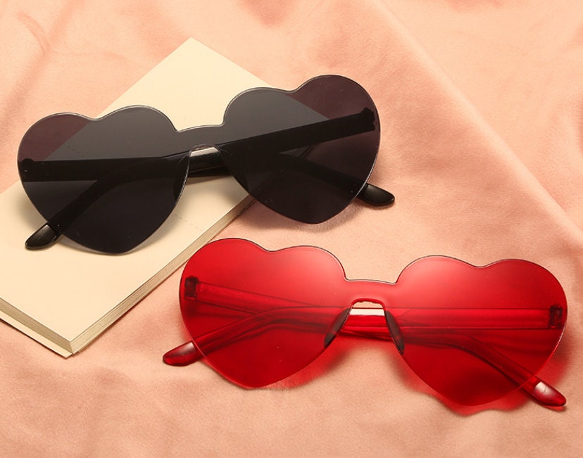 Heart sunglasses / men and women rimless glasses / a dazzling / jelly…