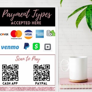 May include: A white sign with black text that reads "Payment Types Accepted Here". The sign lists various payment methods including Discover, Mastercard, Visa, American Express, Venmo, PayPal, Cash App, and Square. The sign also includes two QR codes for scanning to pay with Cash App and PayPal.
