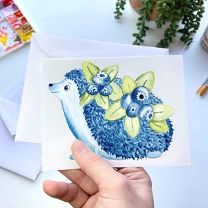 Blueberry Hedgehog Watercolor Greeting Card – Cute Pet Hedgehog Note Card, Blue Fruit Stationery, Whimsical Animal Card