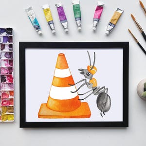 May include: A framed watercolor print featuring an orange and white traffic cone and a cartoon ant wearing a construction hat. Paint tubes, paint brushes, and a palette are arranged around the frame, suggesting an art theme.