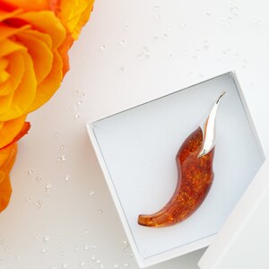 One of a Kind Luxurious Amber Pendant with a Silver Bail