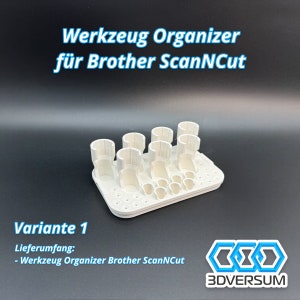 May include: A white plastic tool organizer for Brother ScanNCut machines. The organizer has multiple cylindrical and rectangular slots of varying sizes. The text "Werkzeug Organizer f&uuml;r Brother ScanNCut" is visible in the image.