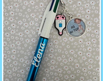 Gepersonaliseerde 4-kleurige Bic-pen met bedel en verzorgerscabochon
