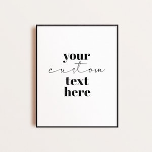 May include: A black framed print with white background and the text "your custom text here" in black.