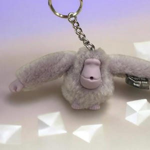 May include: A rustic wooden sign with the text "Welcome to our home" in white lettering. The sign features a distressed finish and a simple, inviting design, perfect for a front porch or entryway.