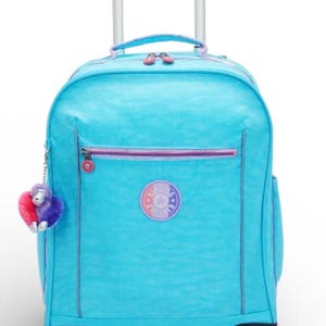 May include: A turquoise rolling backpack with a retractable handle and black wheels. The backpack has a front zippered pocket with a pink zipper and a logo patch. A fuzzy monkey keychain hangs from the side.