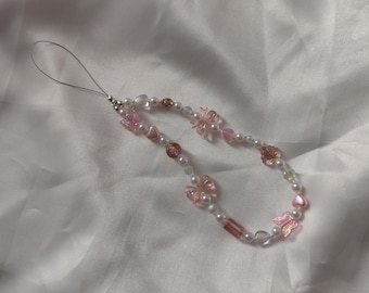 Pink phone charm with bows, pearls and iridescent glass beads, beaded, gift for her