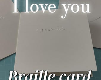 Carte de vœux artisanale en braille pour les fêtes de fin d'année.