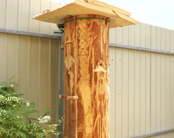 Log beehive for natural beekeeping, Zeidlerei Klotzbeute Klotzstülper, Insect Hotel for garden decoration, Traditional hive for beekeeper