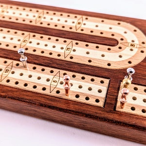 Inlaid Wood 3 Track Travel Sized Cribbage Board Handcrafted Bloodwood w/ European Beech and Maple Inlay Metal Pegs and Cards image 4