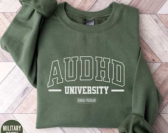 May include: A green sweatshirt with the text "AUDHD UNIVERSITY HONORS PROGRAM" printed on the front.