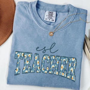 Comfort Colors® ESL Teacher Shirt Daisy English Language Learner Floral Teacher Shirt, ESL Teacher Appreciation, Multilingual Teacher Gift