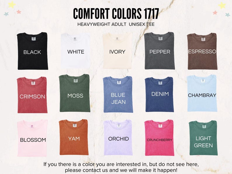 May include: A display of various Comfort Colors 1717 heavyweight adult unisex tees in multiple colors. Colors include black, white, ivory, pepper, espresso, crimson, moss, blue jean, denim, chambray, blossom, yam, orchid, crunchberry, and light green.