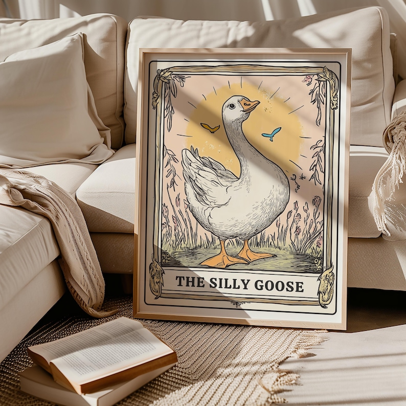 May include: A vintage-style illustration of a white goose with a pink background. The goose is surrounded by green foliage and flowers. The text "The Silly Goose" is printed below the goose.
