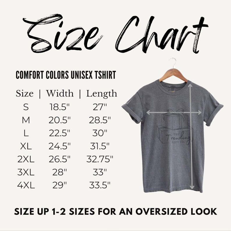 May include: A size chart for a Comfort Colors unisex t-shirt, with measurements in inches. The chart includes sizes S to 4XL, with width and length dimensions. The image also shows a gray t-shirt on a hanger.