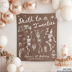 May include: A mocha-colored birthday party backdrop with the text "Death to My Twenties" and "Lauren's 30th Birthday, Miami Beach, FL". The design features dancing skeletons and celebratory icons. Balloons and a cake are in the background.