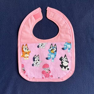 Bluey Face Mask for Child or Toddler: 2-Layer Cotton. Colors available are Blue and Pink. Also baby bib and tote bag. image 14