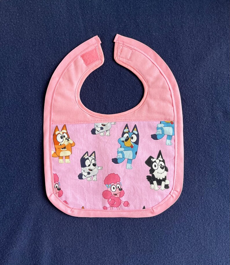 Bluey Face Mask for Child or Toddler: 2-Layer Cotton. Colors available are Blue and Pink. Also baby bib and tote bag. image 14