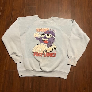 Vintage 1990s California Raisins in the Fast Lane Graphic Crewneck Sweatshirt Pullover USA