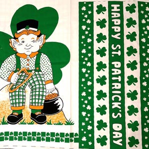 May include: A St. Patrick's Day themed fabric panel featuring a cartoon leprechaun with a pot of gold and a harp. The panel has green shamrocks and the text "HAPPY ST. PATRICK'S DAY".