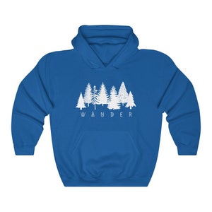May include: A royal blue hooded sweatshirt with a white graphic of a row of trees and the word "WANDER" underneath.