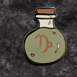 Clearance ** Capricorn Potion Bottle Hard Enamel Pin- 1.25”- 2 posts & Rubber Backing Astrology zodiac pin- the sea goat