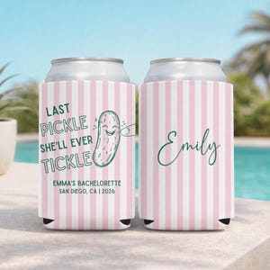 May include: Two can coolers with a pink and white striped pattern. One cooler has the text "LAST PICKLE SHE'LL EVER TICKLE" with a pickle graphic. The other cooler has the name "Emily" in green script. The text "EMMA'S BACHELORETTE SAN DIEGO, CA | 2026" is also visible.
