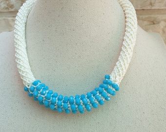 Woven Ivory Necklace With Light Blue Crystal Bead Detail