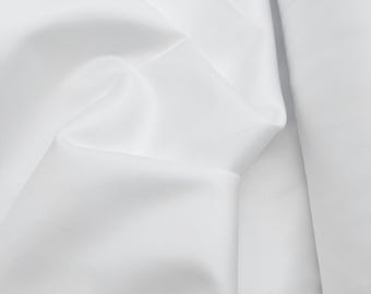 Raso di cotone largo 240 cm. Bianco neve, drappeggio setoso, al metro